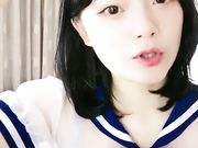 妹子小尺度诱惑 情趣学生透视装椅子上漏奶自慰